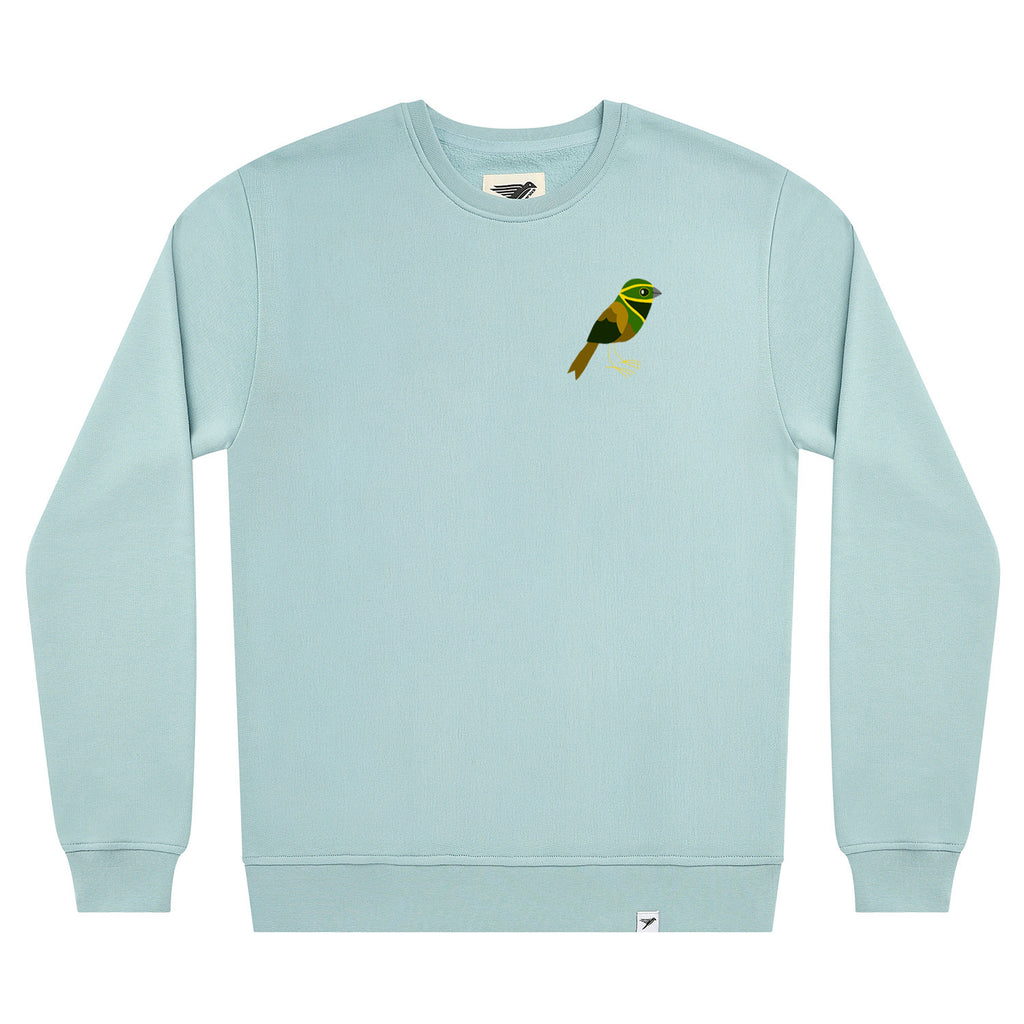 A light blue crewneck sweatshirt featuring a small embroidered cirl bunting bird graphic on the left chest, displayed against a solid white background.