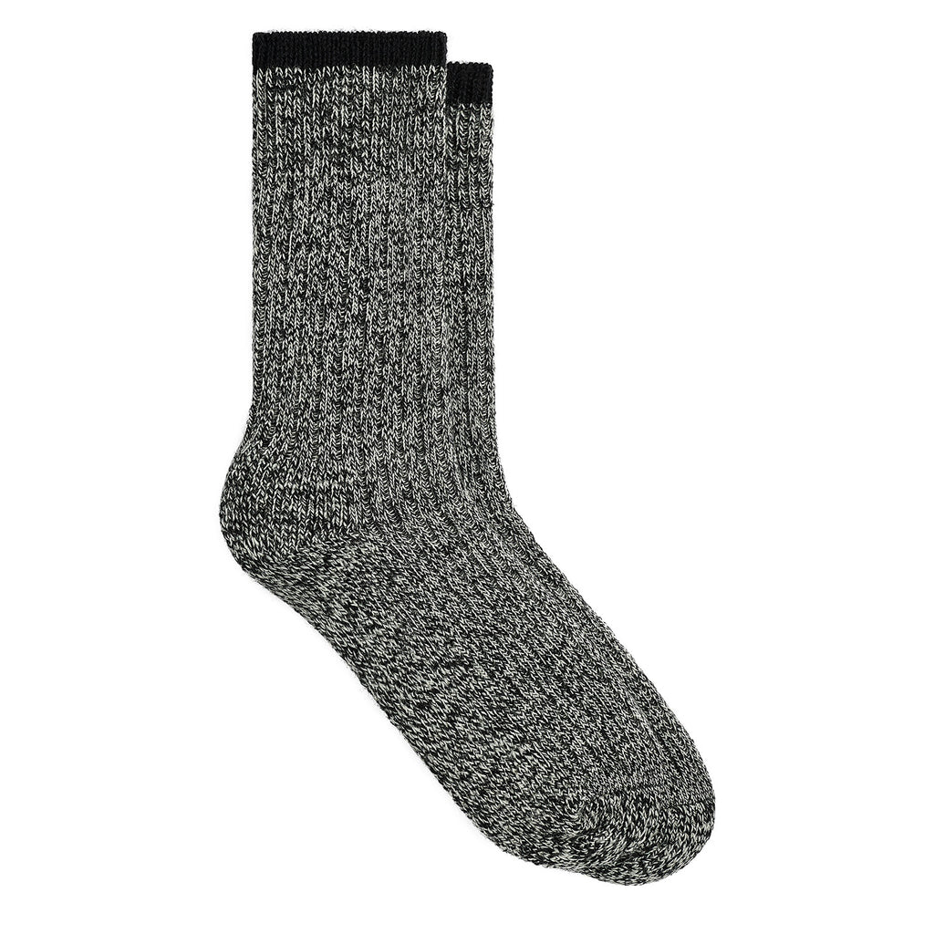A pair of heathered gray and black crew socks with solid black ribbed cuffs, made from British Wool.
